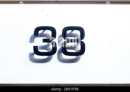 House number 38 in stark relief Stock Photo