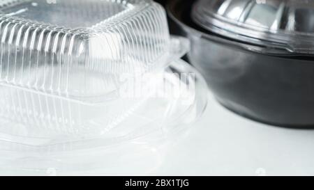 Black and white Plastic food containers on white background Stock Photo