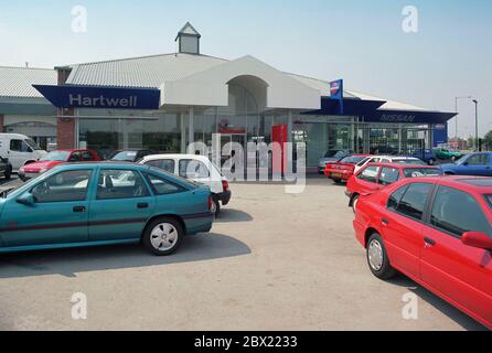 1995, Nissan Car dealership at Manchester, north west England, UK Stock Photo