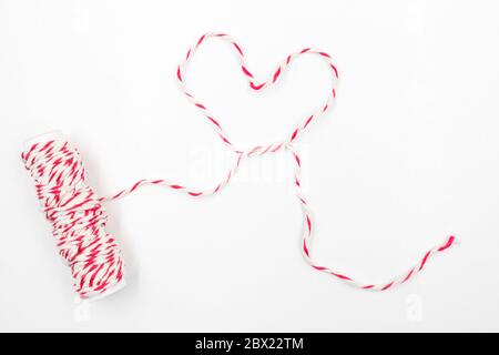 Heart Curved Thick String And A Roll Isolate On White Background Stock  Photo, Picture and Royalty Free Image. Image 10940369.