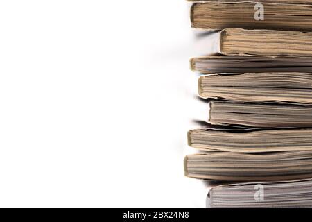 selective focus of the stacking magazine place on white background. Colorful abstract background Stock Photo