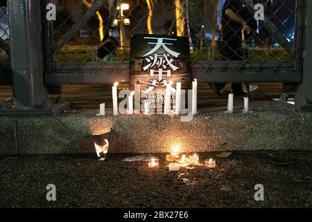 Causeway Bay, Hong Kong. 04, June, 2020. Memorial candles are lit commemorating the student protests in China in Tiananmen Square, despite being banned in China and Hong Kong. © Danny Tsai / Alamy Live News Stock Photo