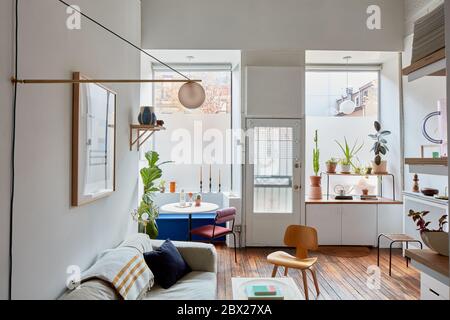 Livingroom in eclectic home office studio Stock Photo
