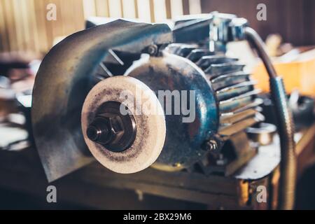 Electric motor in the workshop - grindstone - locksmith Stock Photo