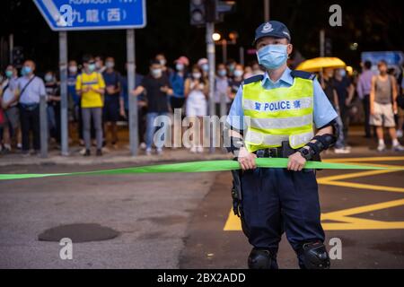 HONG KONG - JUNE 4 2020: Thousands of people packed Victoria Park during the 30th Anniversary for Tiananmen Masscre in 1989. Stock Photo