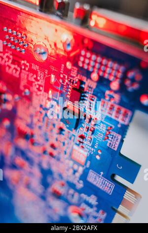 gpu Graphics Proccesing Unit white background on white background details macro blue red light chip Stock Photo