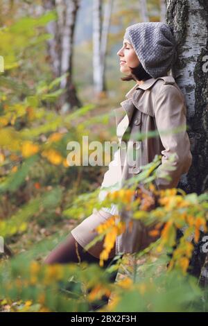 Beautiful woman enjoying nature with eyes closed . Seasonal and outdoor Stock Photo