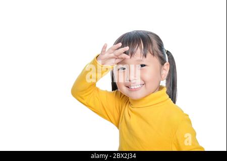 Asian little girl smile looking away on white background with copy space Stock Photo