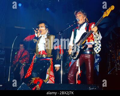 Adam and The Ants performing in Birmingham circa 1984: left Marco Pirroni,Adam Ant,Gary Tibbs Stock Photo