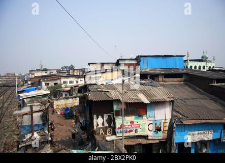 Mumbai/India - 24/11/14 - Dharavi Slums rooftop views next to railway line Stock Photo