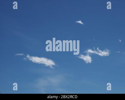 blue sky with cumulus clouds useful as a background Stock Photo - Alamy