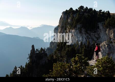 France, Drôme (26), Vercors Regional Nature Park, Vercors Highlands National Nature Reserve, Châtillon-en-Diois, hiker contemplating the first lights of day on the Pre-Alps Stock Photo