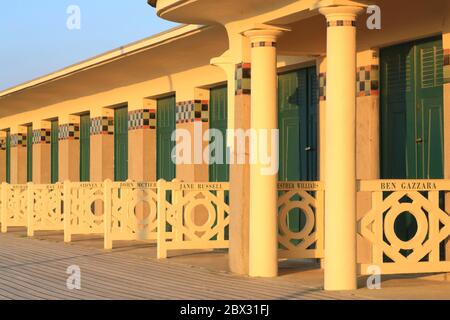 France, Calvados, Cote Fleurie, Pays d'Auge, Deauville, Les Planches (promenade on the beach), Art Deco bathing huts (Pompeii baths) designed in 1922 by the architect Charles Adda with the names of various movie stars: Ben Gazzara, Jane Russell, Esther Williams ... Stock Photo