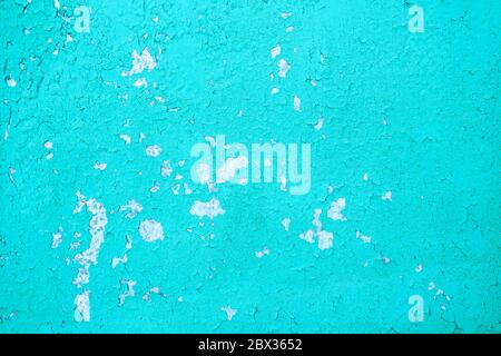 aged cracked blue paint on the cement wall Stock Photo