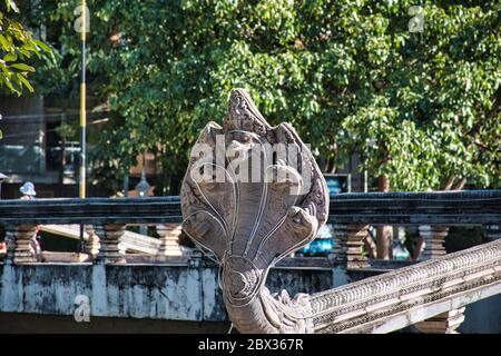 5 Headed Naga, Serpent sculpture in Siem Reap these creatures are divine, semi-divine deities, or a semi-divine race of half-human half-serpent beings Stock Photo