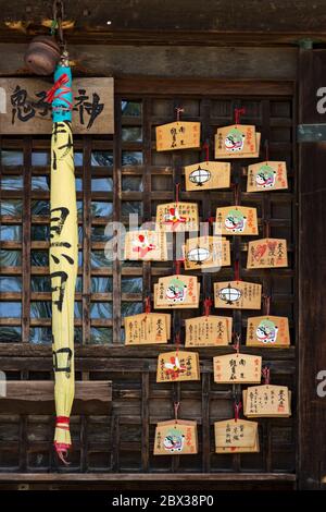 Nara / Japan - May 12, 2018: Ema, small wooden plaques (prayer cards) at the Shinto shrine in Nara, Japan Stock Photo