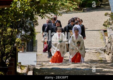 Nara / Japan - May 12, 2018: Japanese wedding ceremony in Shinto shrine in Nara, Japan Stock Photo