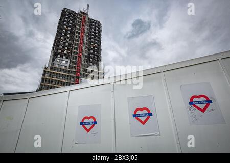 Charred remains of Grenfell Tower - 24-storey residential tower block in London, destroyed by severe fire in July 2017. Picture taken on 18/02/20018 Stock Photo