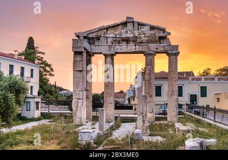 The Gate of Athena Archegetis at sunset at Roman Agora, Athens, Greece Stock Photo