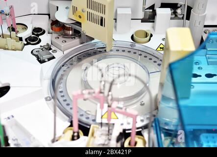 Potsdam, Germany. 02nd June, 2020. In the modular Cobas 8000 analyzer, the liquid is taken from the coded patient tubes by a pipette in the laboratory of the Ernst von Bergmann Hospital, placed in cuvettes and tested for antibodies by subsequent addition of reagents. Among other things, the device enables an automated process for the detection of SARS-CoV-2 antibodies. The hospital could analyse up to 470 corona tests per day. Credit: Soeren Stache/dpa-Zentralbild/ZB/dpa/Alamy Live News Stock Photo