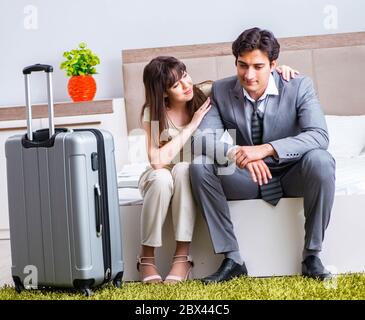 The wife seeing her husband off to business trip Stock Photo