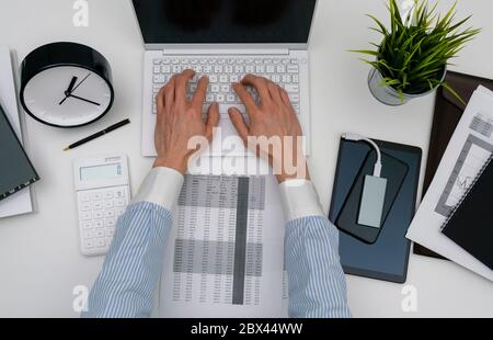 Businessman working at office desk Stock Photo