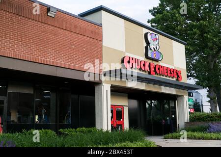 A logo sign outside of a Chuck E. Cheese location in Annapolis, Maryland on May 25, 2020. Stock Photo