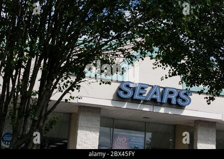 A logo sign outside of a Sears Hometown retail store location in Chestertown, Maryland on May 25, 2020. Stock Photo