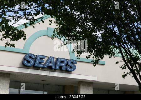 A logo sign outside of a Sears Hometown retail store location in Chestertown, Maryland on May 25, 2020. Stock Photo