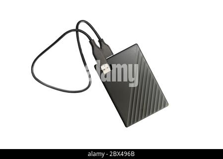 External compact SSD-drive with USB cable for writing, reading and storing data. isolated on white, top view Stock Photo