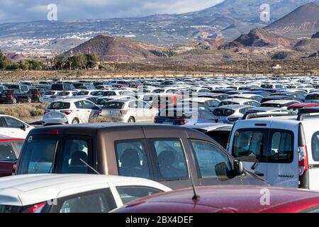 Thousands of unused hire cars are parked up in temporary storage due to the effects of zero tourism and no holidaymakers coming to the island. The ren Stock Photo