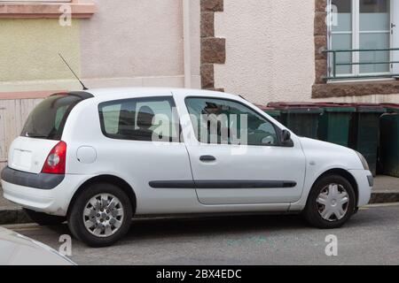 Broken car window after a theft in a street Stock Photo