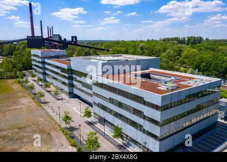 New building of the Folkwang University of the Arts, on the site of the Zollverein Coal Mine Industrial Complex in Essen, in the rear the Zollverein c Stock Photo