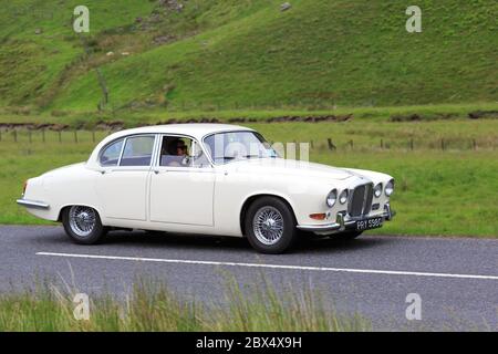 MOFFAT, SCOTLAND - JUNE 29, 2019: 1968 Daimler Sovereign saloon  car in a classic car rally en route towards the town of Moffat, Dumfries and Galloway Stock Photo