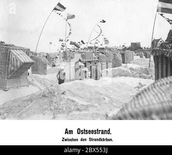 Between the beach chairs on the Baltic Sea beach. Stock Photo