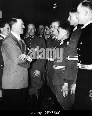 Adolf Hitler in conversation with General Busse. Second from left is ...