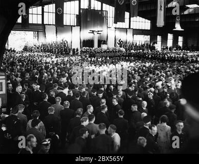 Speech by Reich Minister of Propaganda Joseph Goebbels in front of employees of the Berliner Verkehrsgesellschaft during the roll call at the bus depot in Helmholtzstrasse. Stock Photo