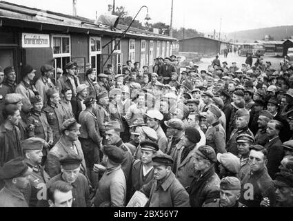 Soldiers and workers listen to a speech by Adolf Hitler in a camp on the Westwall (Siegfried Line). Stock Photo