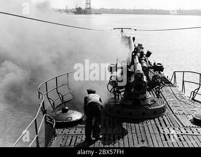 The German shipyard industry during the war concentrated exclusively on the production of new submarines. This was the only way to survive against the Allies at sea. Attempts to overcome the British Navy by armament had already failed miserably in the First World War. Consequently, 1170 new submarines have been built. Stock Photo