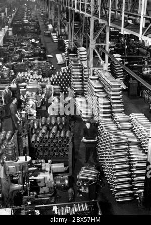 An armaments factory manufactures ammunition and grenades of various shapes for the war. Stock Photo