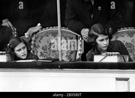 Elizabeth II and her sister Princess Margaret Rose (left) are attending the National Pony Show at the Royal Agriculture Hall in Islington, London. Stock Photo