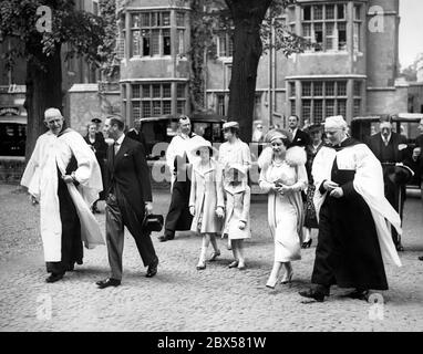 Provost Lord Hugh Cecil, King George VI, Princess Elizabeth and Princess Margaret Rose, Queen Elizabeth and Vice-Provost Mr. C.H.K. Marten on their arrival to the morning service at Eton College Chapel. In the background are the headmaster Mr. Claude Elliott and Princess Mary. Stock Photo