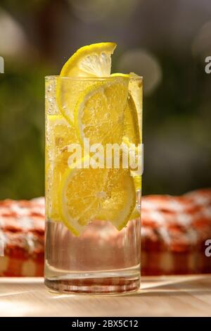 Citrus lemonade in garden setting,summer drink