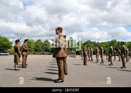 Recruits are inspected during a passing out parade at Sir John Moore Barracks, Winchester, the first batch of soldiers to complete their training in the Army Training Regiment (Winchester) since the coronavirus lockdown. Stock Photo