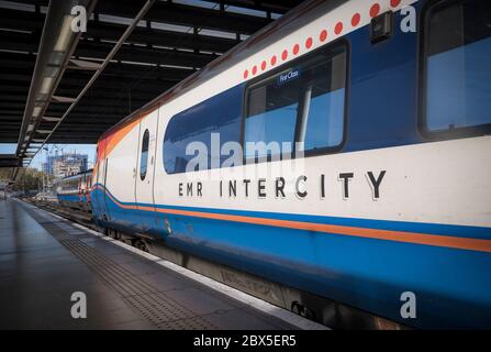 Train carriage in East Midlands Railway Intercity livery waiting at St. Pancras International railway station, London, England. Stock Photo