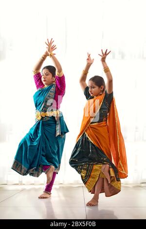 Bharatnatyam dancer performing with her student Stock Photo