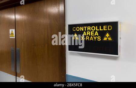 Sign outside an X-Ray room in a UK hospital. Stock Photo