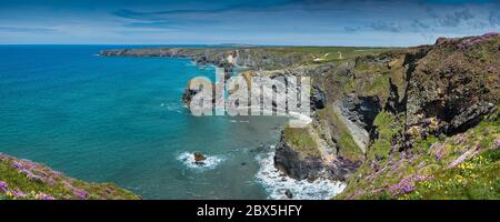 A panoramic view of the wild rugged coast at Bedruthan Steps in Cornwall. Stock Photo