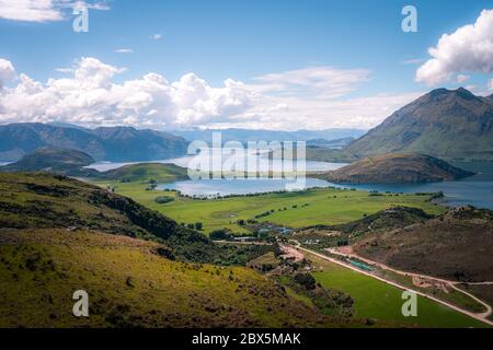 The dark surface of Diamond Lake in Wanaka, New Zealand Stock Photo