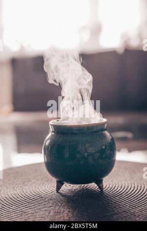 Frankincense burning on hot coal, aromatic resin, religious rites, incense and perfumes, incense smoke, religion Stock Photo